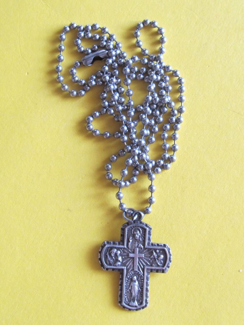 Vintage Catholic silver cross pendant on stainless steel chain